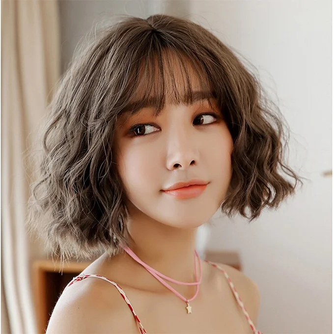 Kiểu tóc ngắn uốn xoăn xù nhẹ thời trang